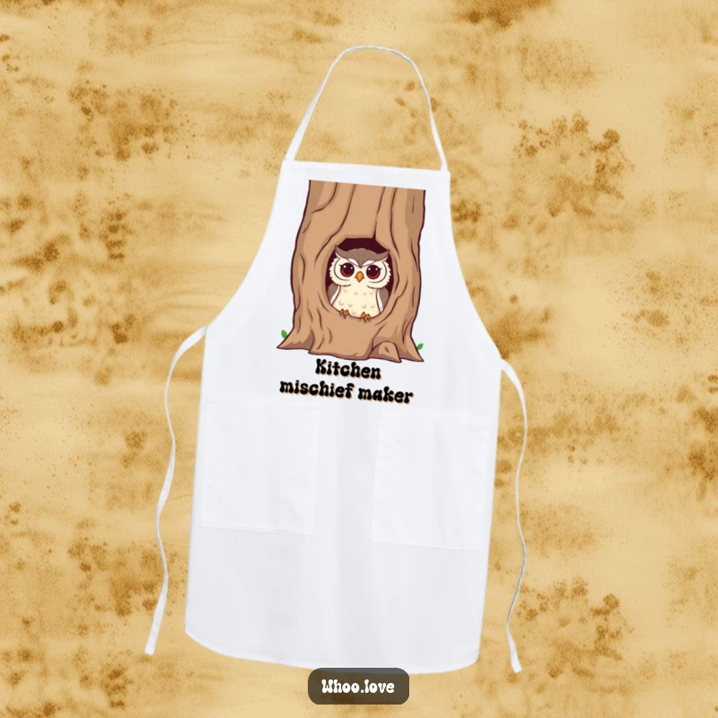 Funny owl apron showing a mischievous owl peeking from a hollow tree trunk, adding a playful and humorous touch to kitchen duties.