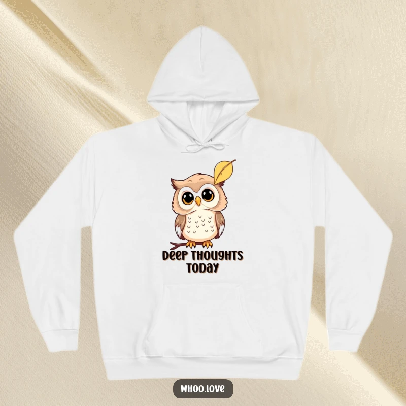 Funny hoodie showcasing a curious owl tilting its head at a falling leaf, perfect for moments of quiet observation, a funny gift.