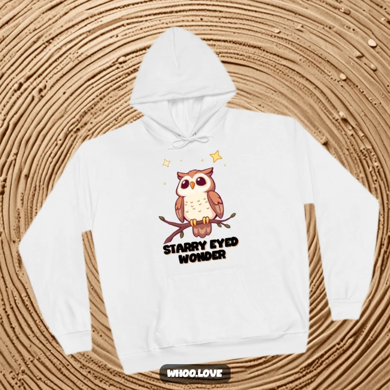 Funny hoodie featuring a cheerful owl perched, looking up in awe at a vast, star-filled night sky.