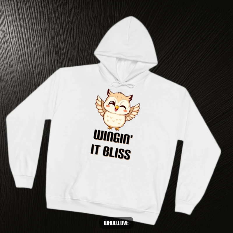 Funny hoodie showcasing a kawaii owl in fits of giggles, joyfully flapping its wings with infectious enthusiasm.