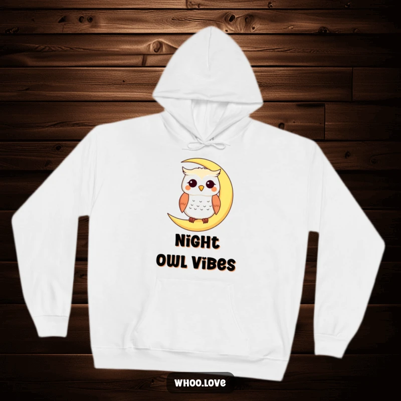 Funny hoodie showcasing a smiling owl perched on a crescent moon, radiating peace and wonder, a perfect funny gift.
