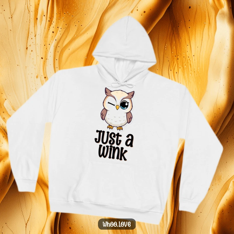 Funny hoodie with a charming owl character giving a knowing wink with its oversized eye, exuding confidence.