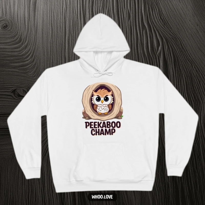 Funny hoodie featuring a curious owl with slightly ruffled feathers, peeking out from a hollow log.
