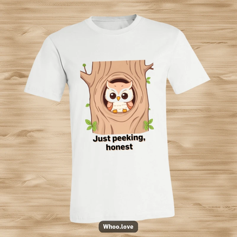 Funny t-shirt featuring an owl peeking playfully from a tree hole, exuding mischief and charm.