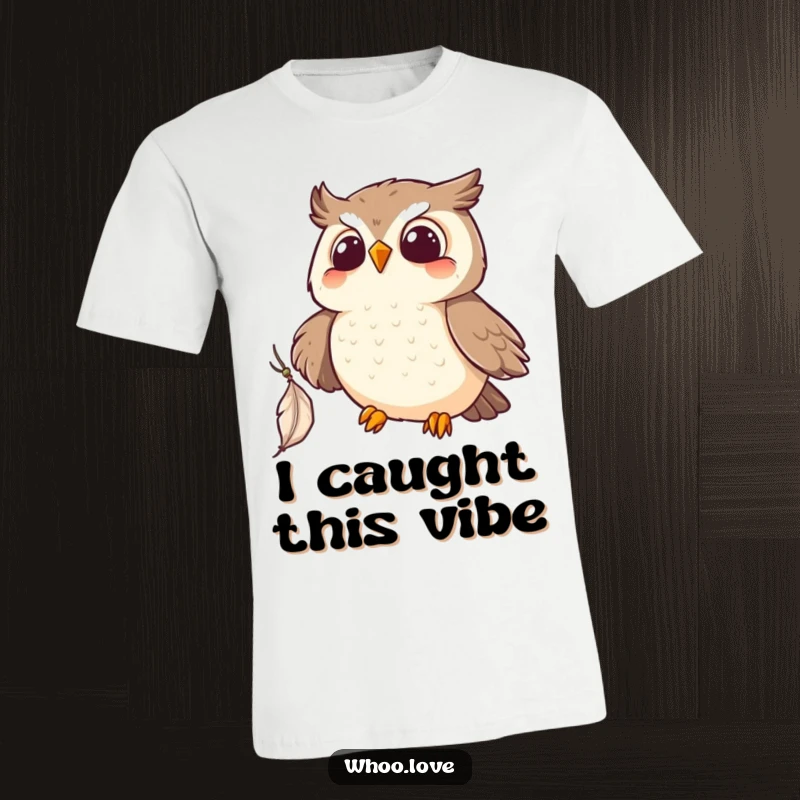 Funny Kawaii owl t-shirt, enthusiastically snagging a floating feather with a cheerful expression. Great funny gift.