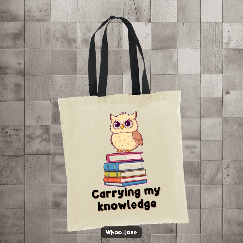Funny tote bag with a fluffy owl precariously balancing on books with a determined grin, perfect for book lovers.
