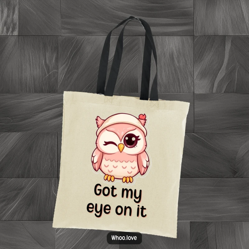 Funny kawaii owl winking with its big eye, wearing a miniature hat, printed on a reusable and stylish tote bag.